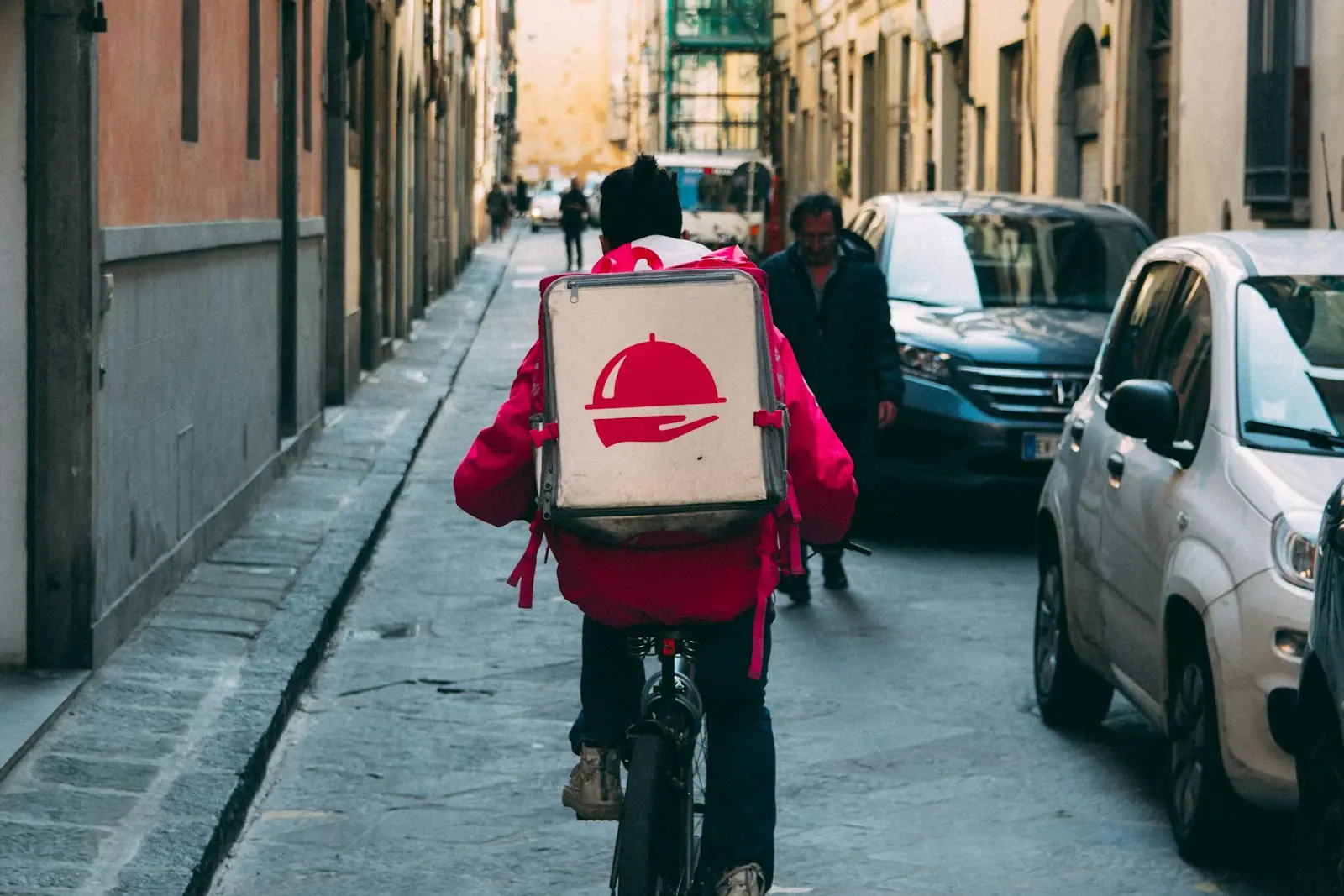 Delivery driver bag in front of restaurant entrance
