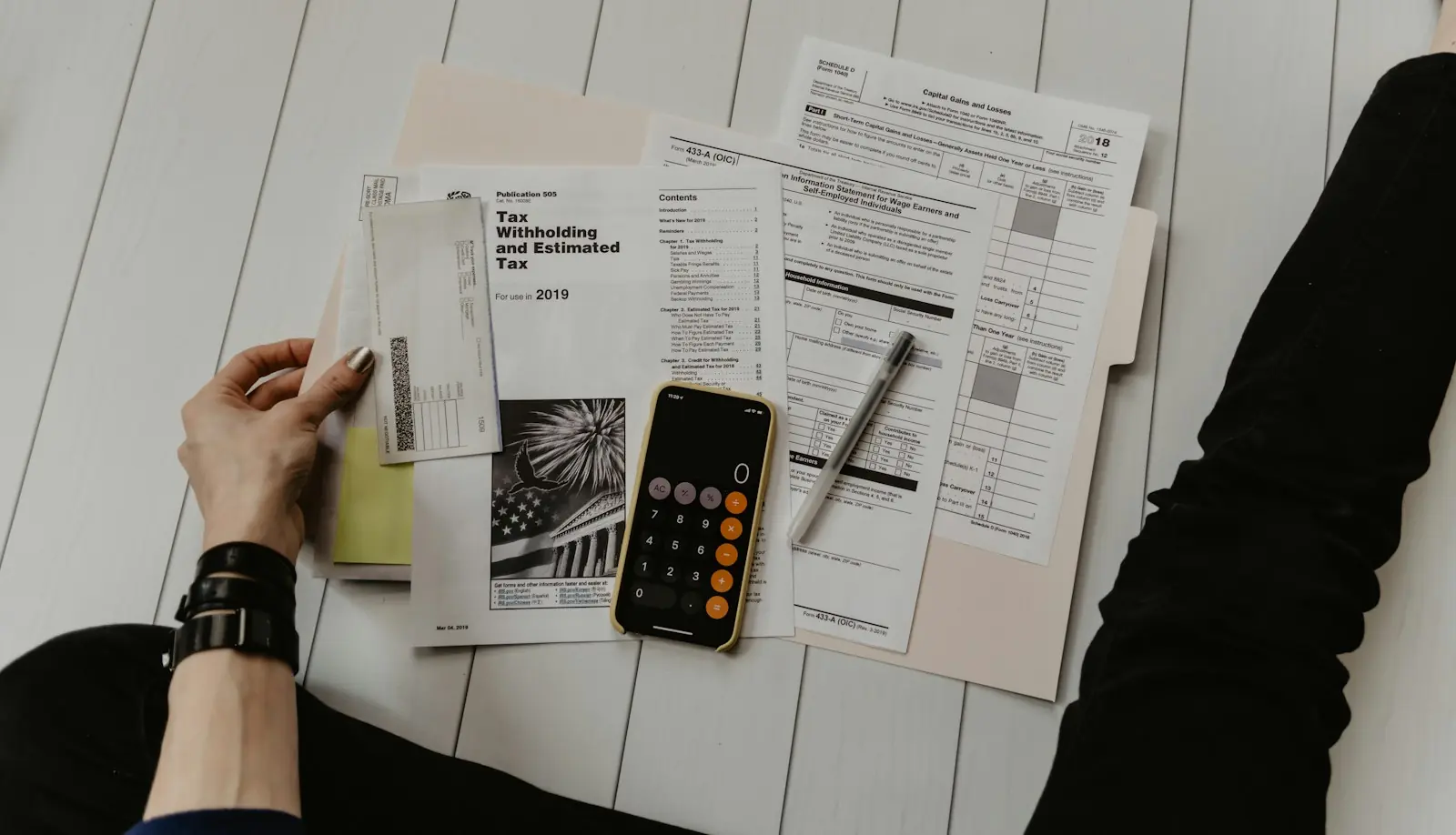 Restaurant operator reviewing financial reports