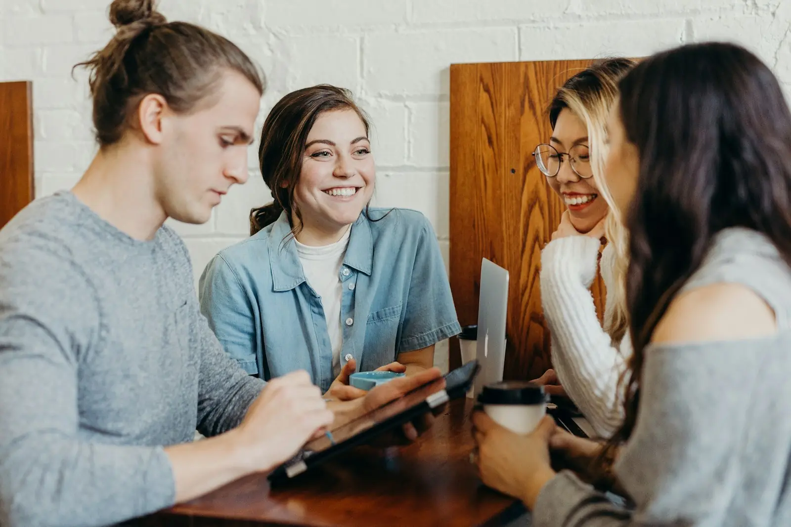 Happy customers together at a restaurant table